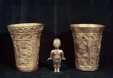 Two Chimu vases with mythological figures and a small female Mochica idol